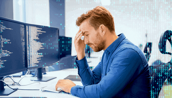 Young Professional Developer In Modern Tech Office Disgruntled With Ongoing It Problem
